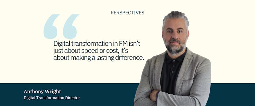 cream banner with navy text and a man with grey hair and beard wearing a black shirt and grey jacket