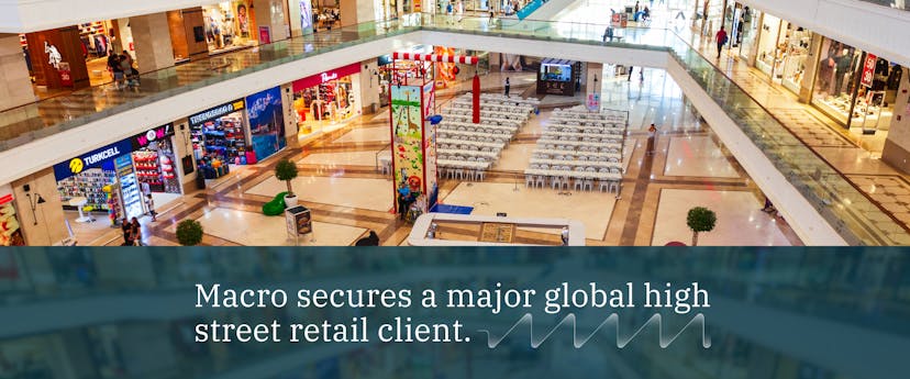 image of retail centre with navy banner and blue text