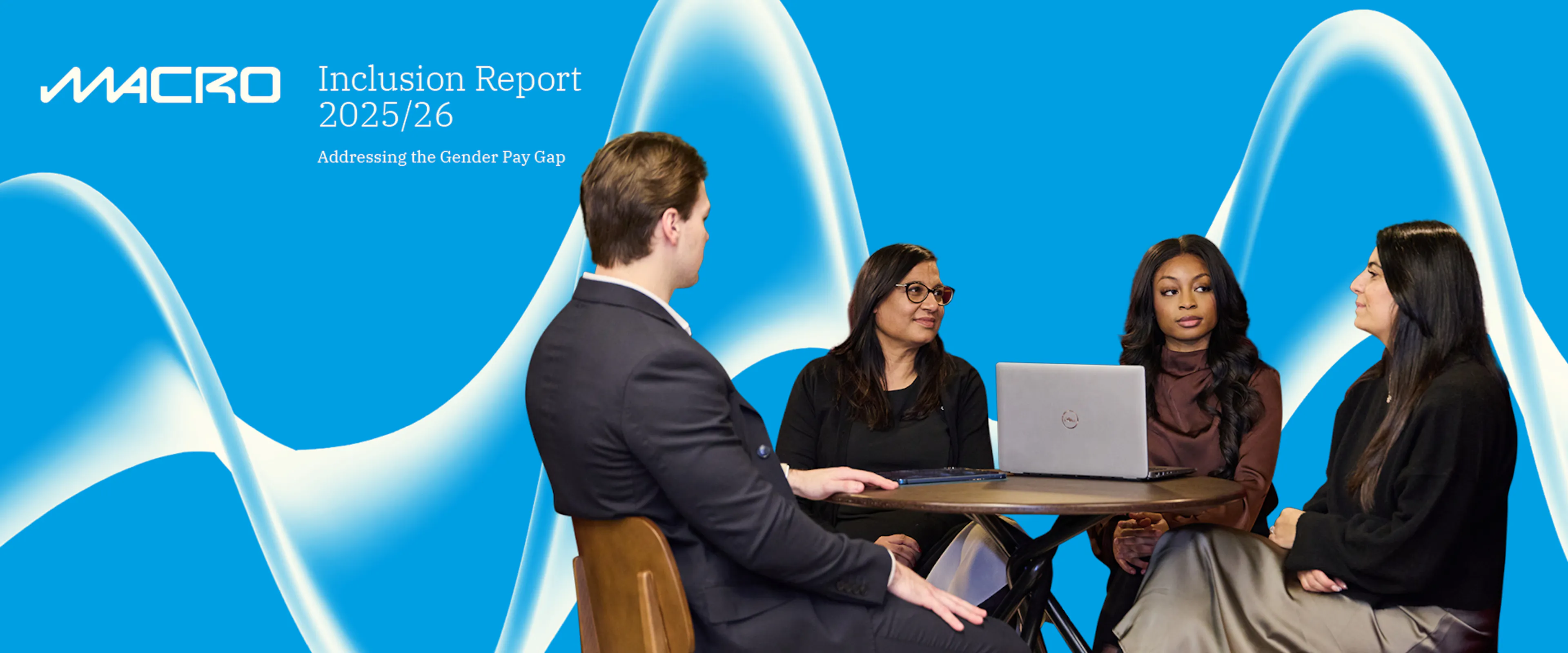 blue banner with three women and a man sitting around a laptop