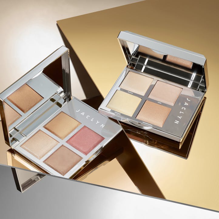 Two Jaclyn Hill compacts of natural palette shadows from her Jaclyn Hill Cosmetics line.