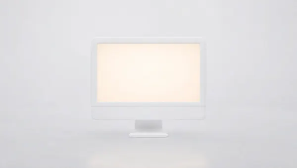 Monitor di computer scolpito in materiale bianco opaco, con lo schermo vuoto che emette un bagliore ambra caldo su fondo chiaro