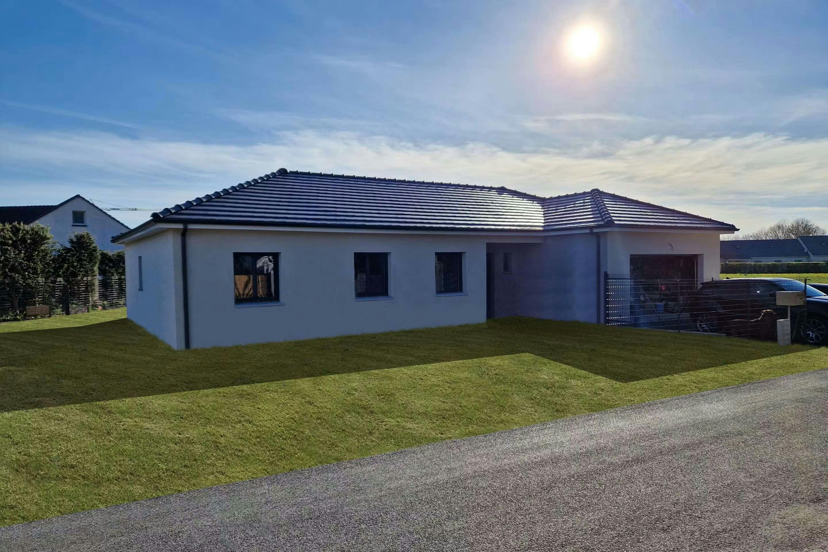 Toiture tuiles noires à Olby