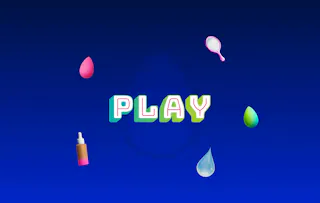 A blue background image with a big "PLAY" in the middle, surrounded by makeup products: a pink beauty blender, a pocket mirror, a concealer, a drop of water and a green beauty blender.
