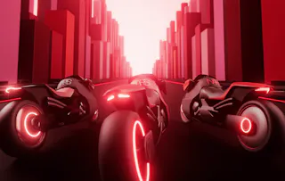 3 motorbikes lined up on a street made of lipstick-shaped buildings.