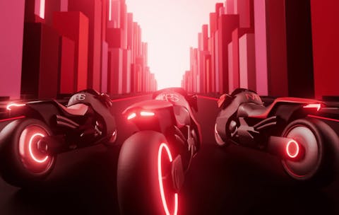 3 motorbikes lined up on a street made of lipstick-shaped buildings.