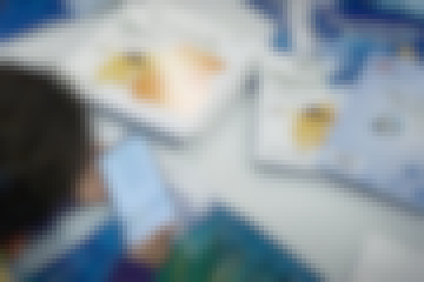 Child with Storysign reading books