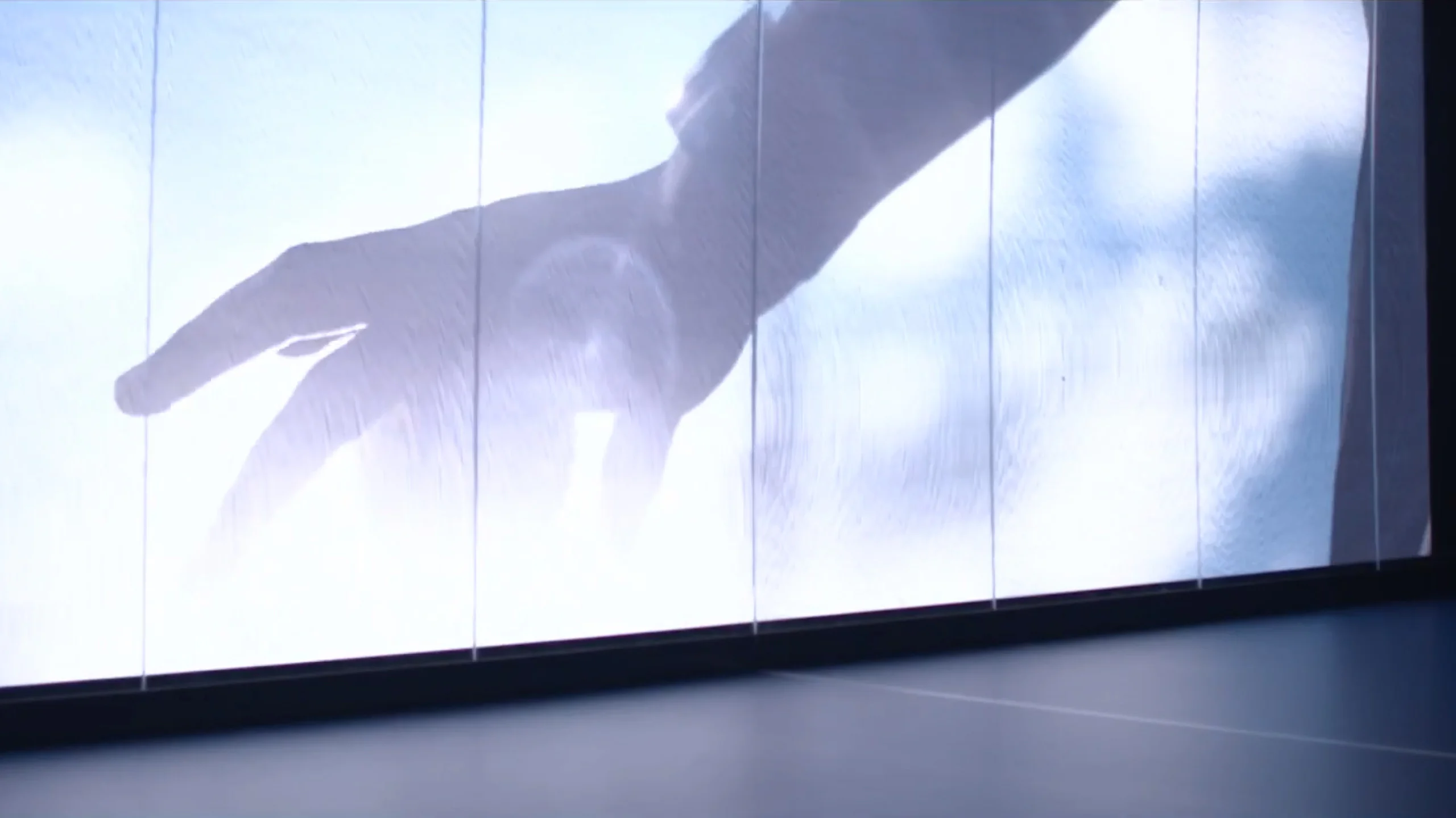 We saw a screen with an hand on it