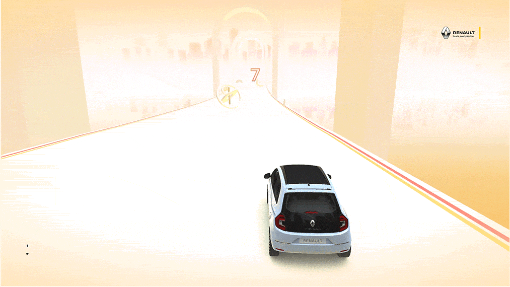 The blue Twingo car is dodging all obstacles as requested to finish the game.