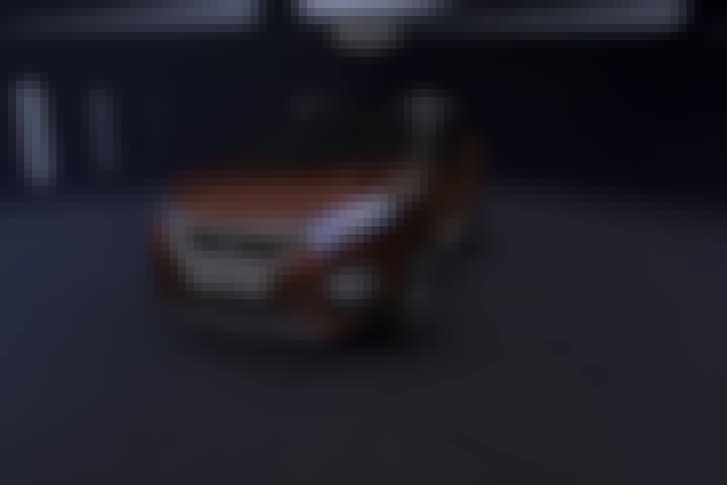 Front of an orange Peugeot 3008
