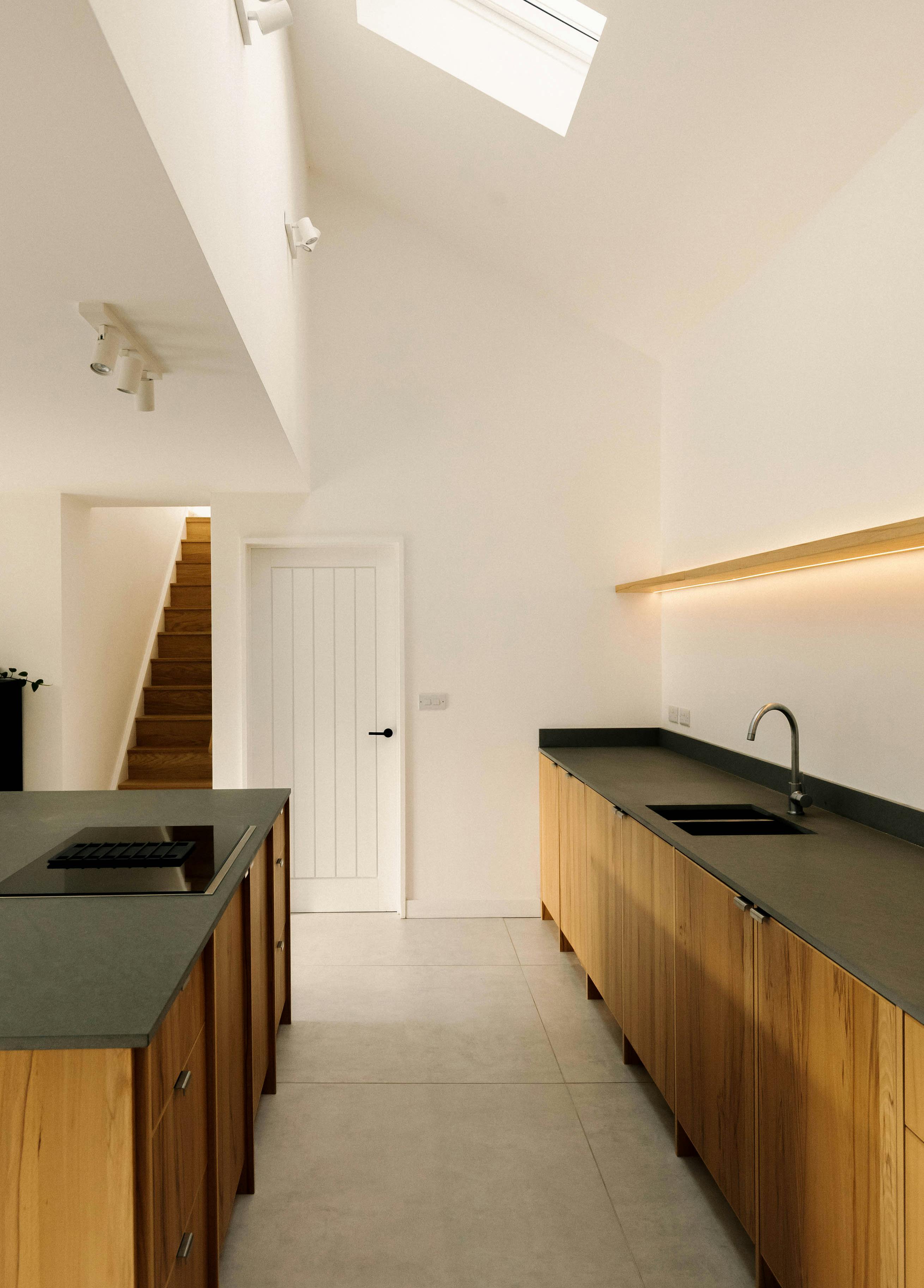 Contemporary wooden Ma-kon kitchen with limestone worktop in Northumberland.
