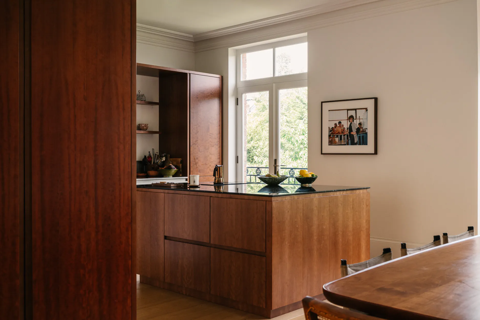 Cherry timber, black marble and stainless steel Ma-kon kitchen.