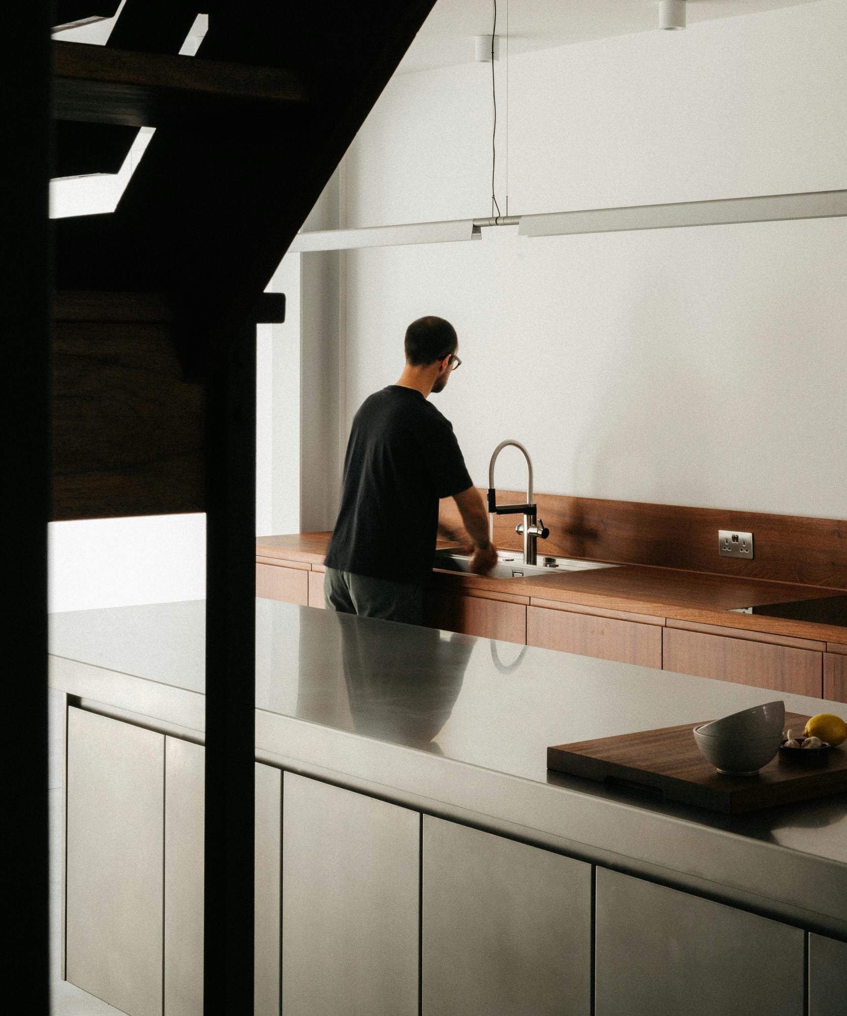 Contemporary sapele and stainless steel Ma-kon kitchen.