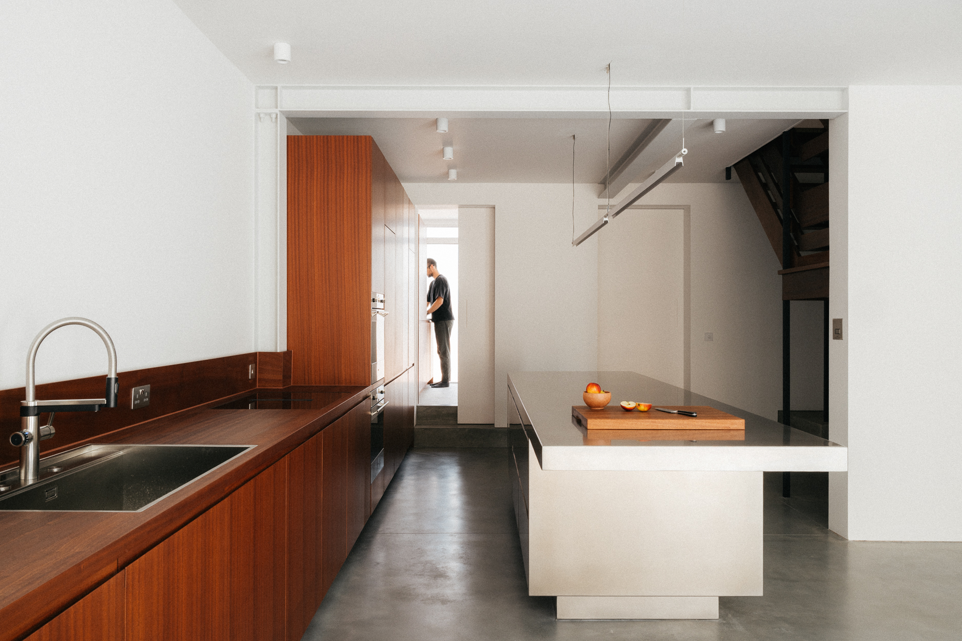 Contemporary sapele and stainless steel Ma-kon kitchen.