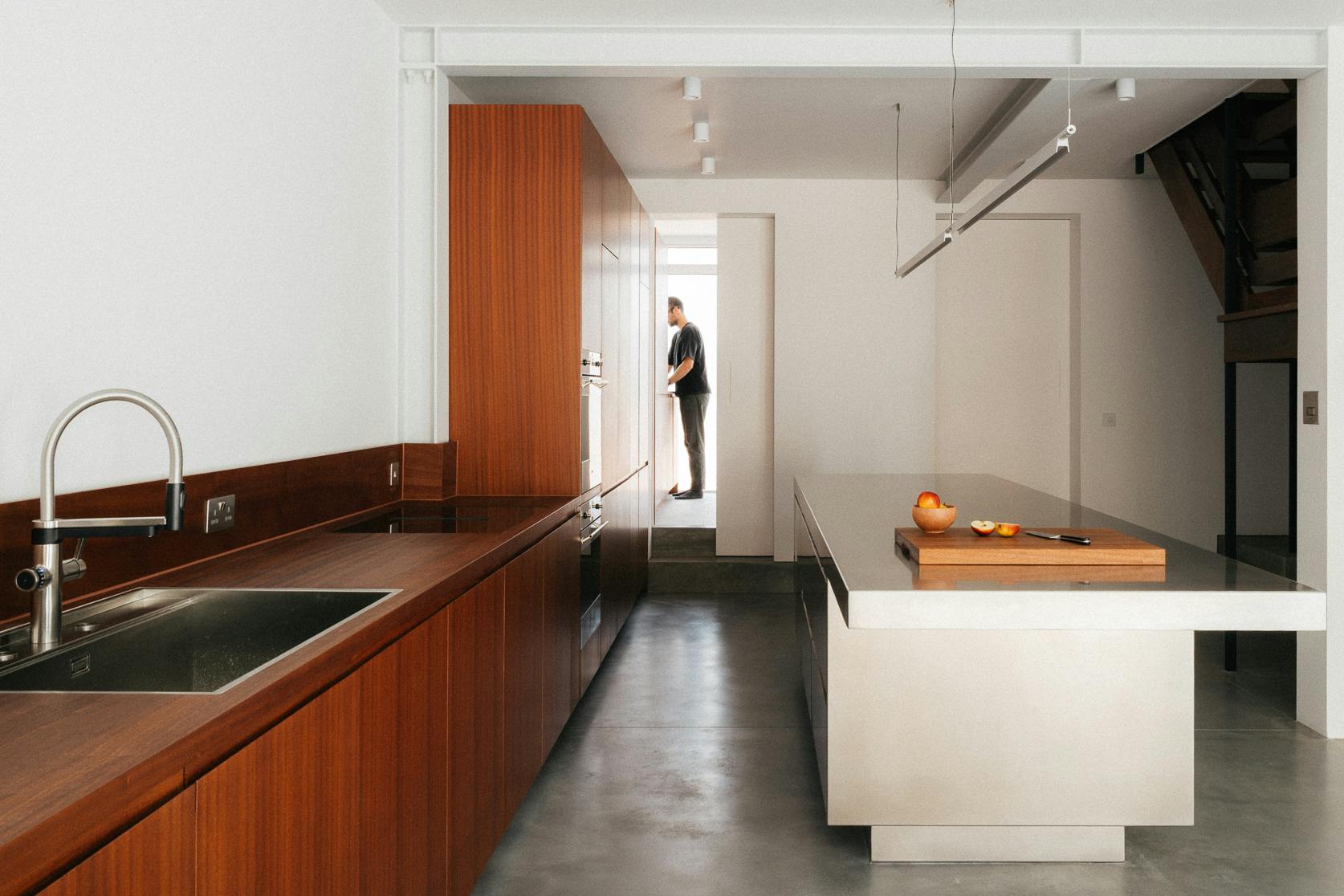 Contemporary sapele and stainless steel Ma-kon kitchen.