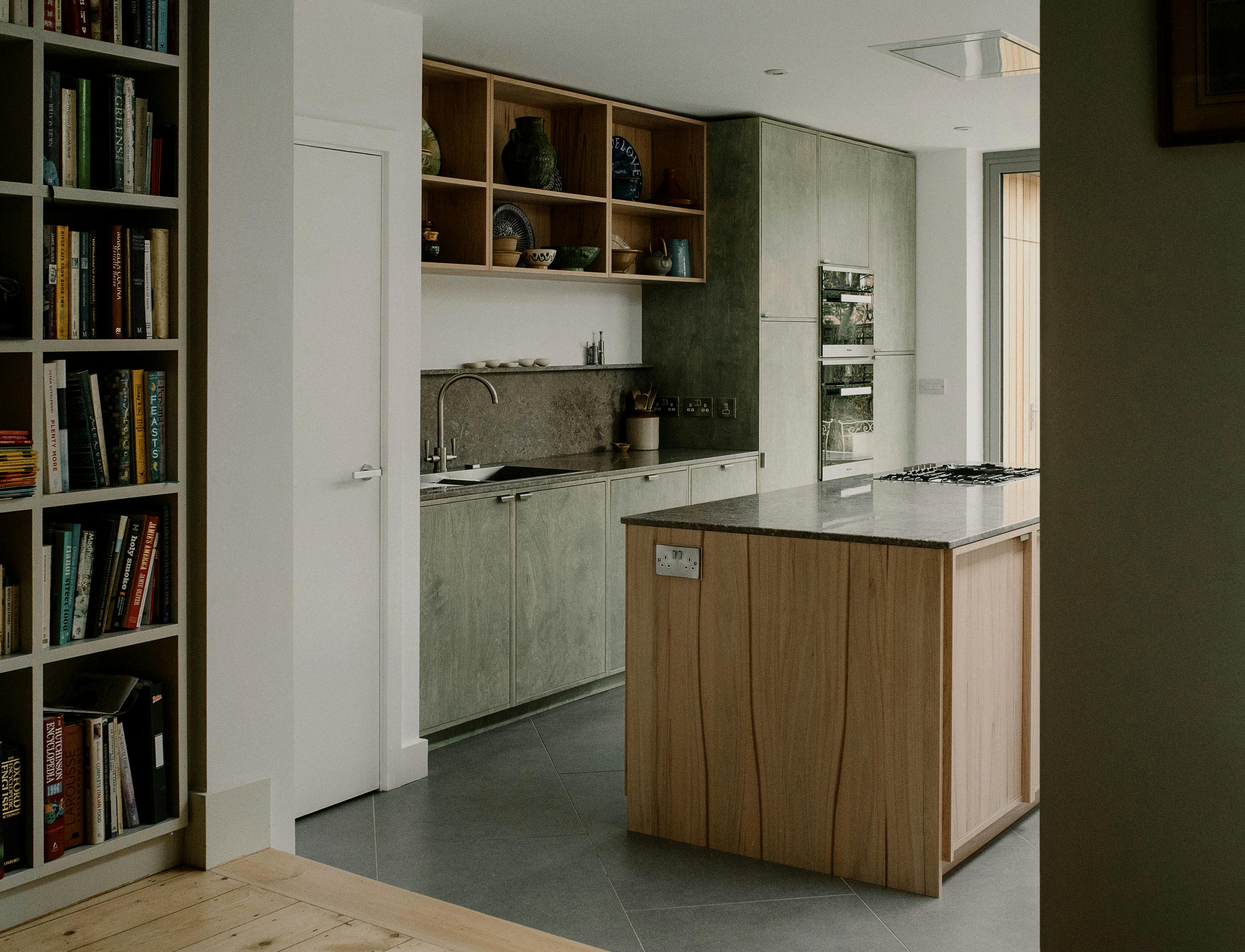 Contemporary wooden Ma-kon kitchen with limestone worktop in Sheffield.