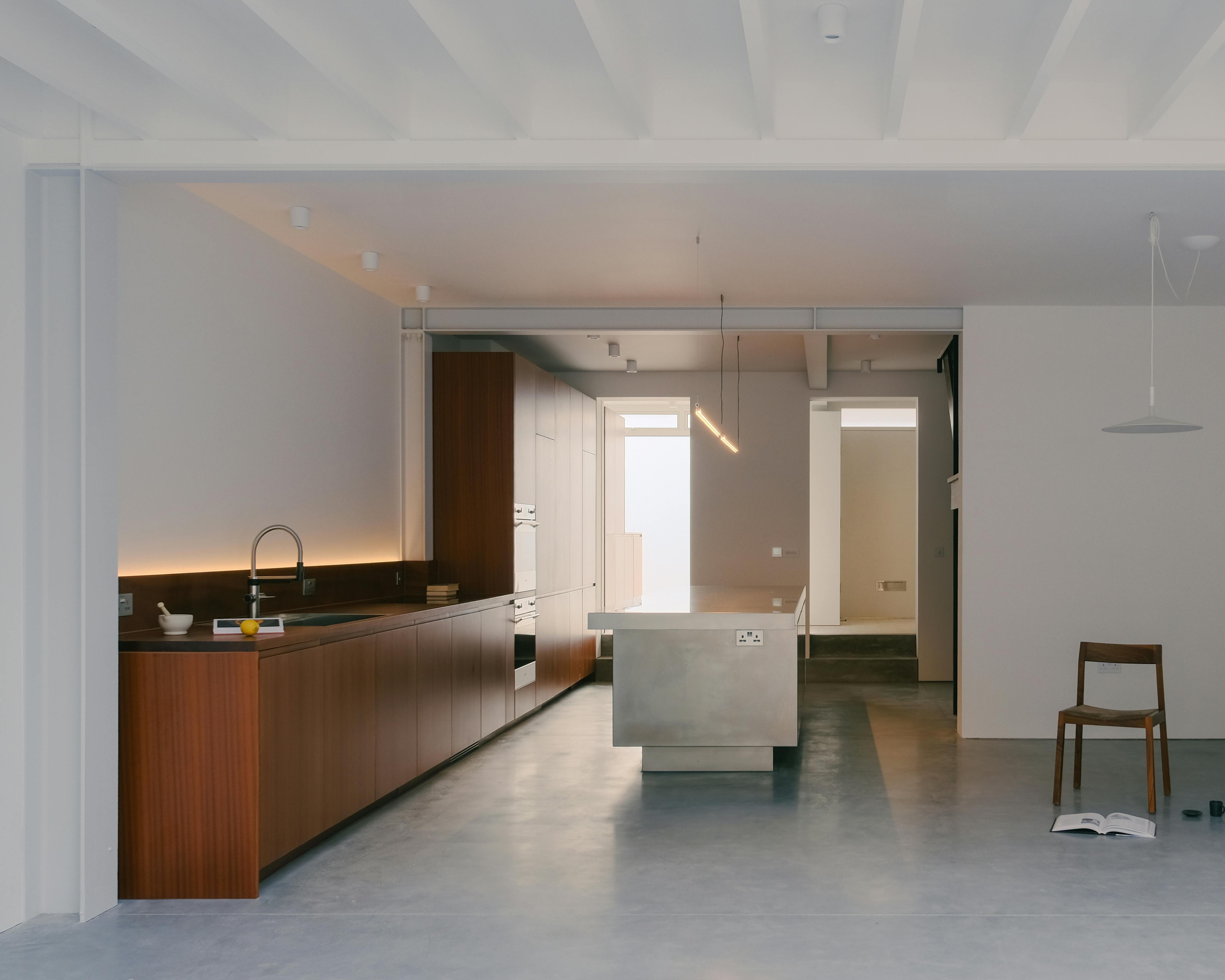 Contemporary sapele and stainless steel Ma-kon kitchen.