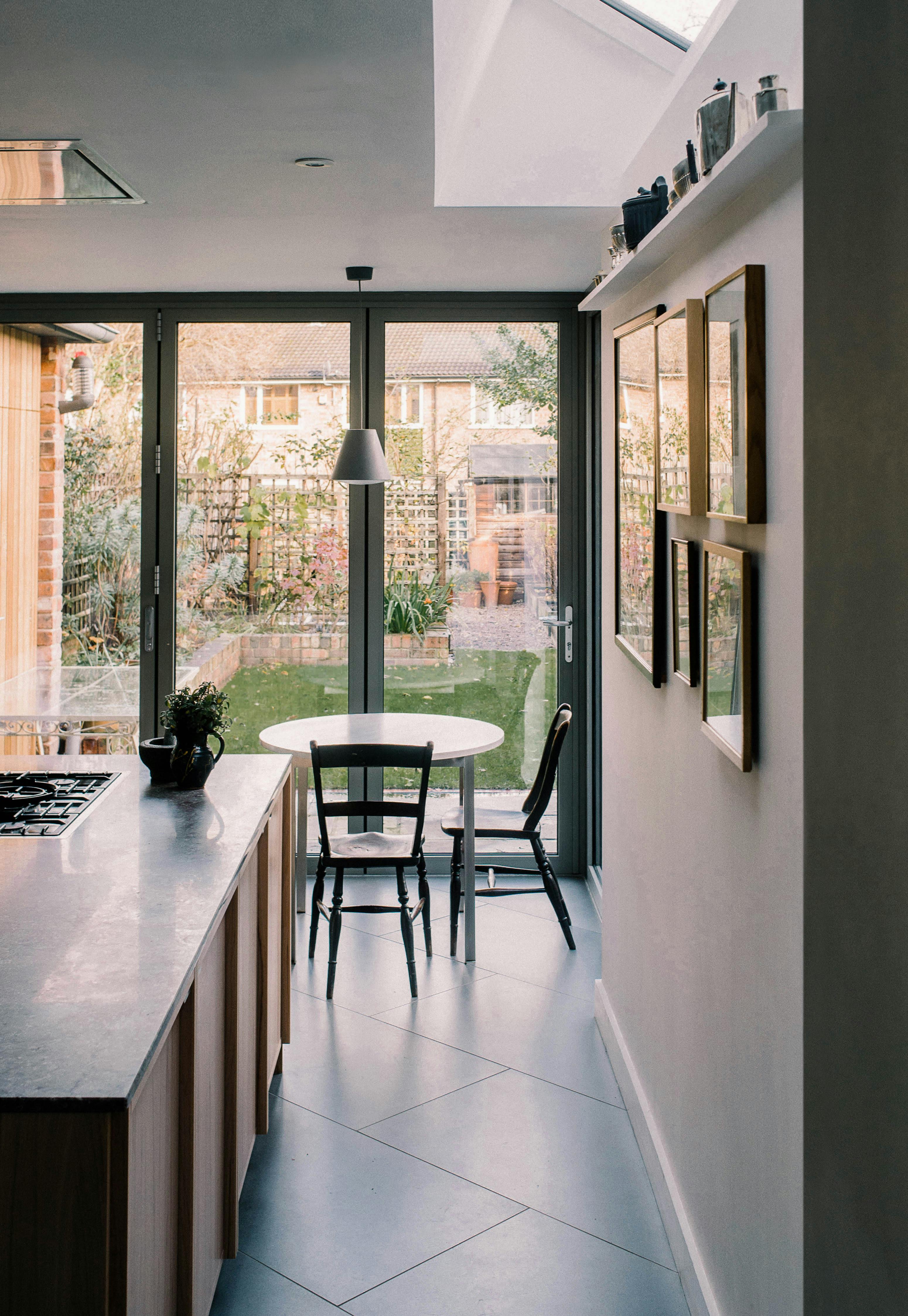 Contemporary wooden Ma-kon kitchen with limestone worktop in Sheffield.
