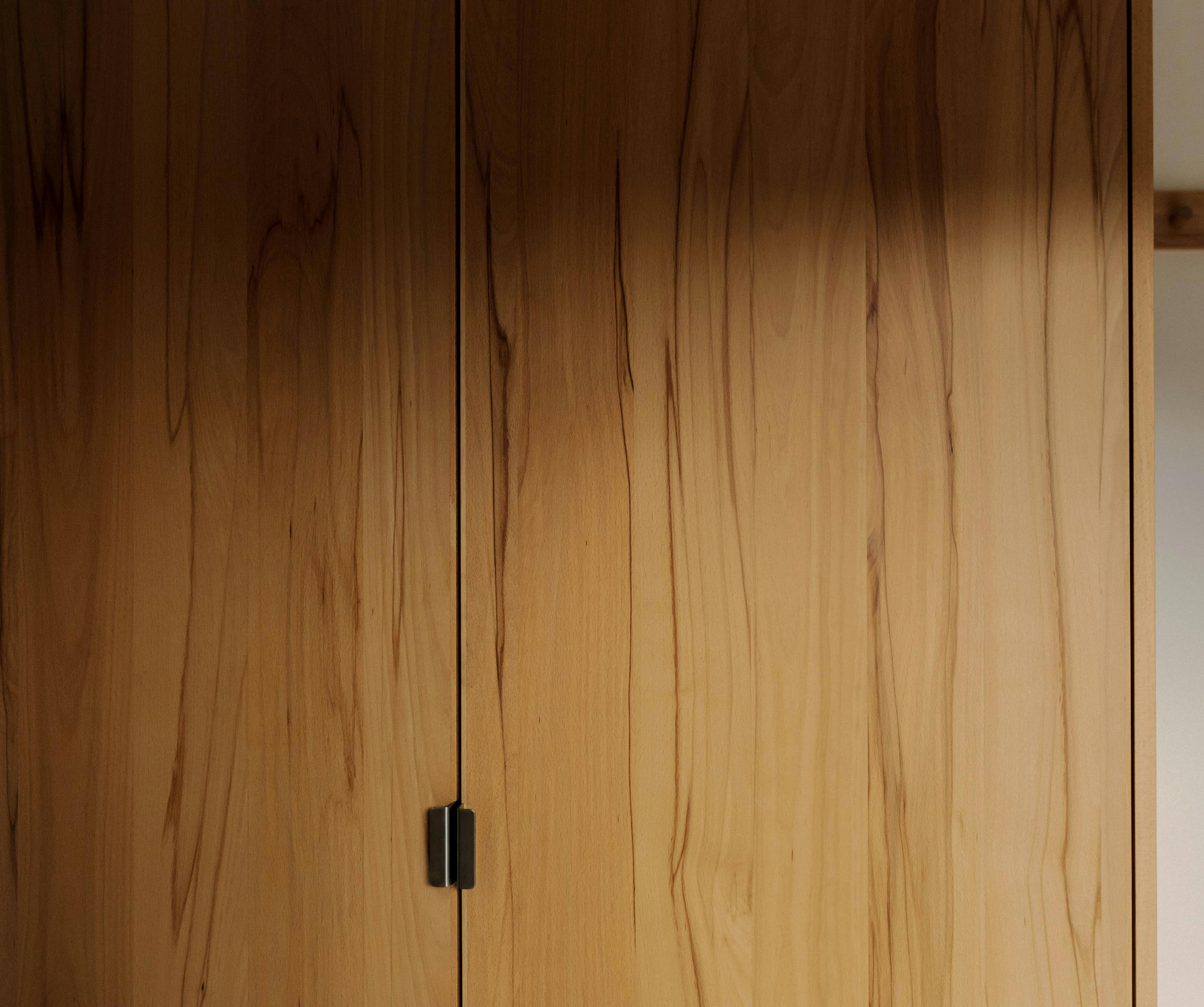 Contemporary wooden Ma-kon kitchen with limestone worktop in Northumberland.