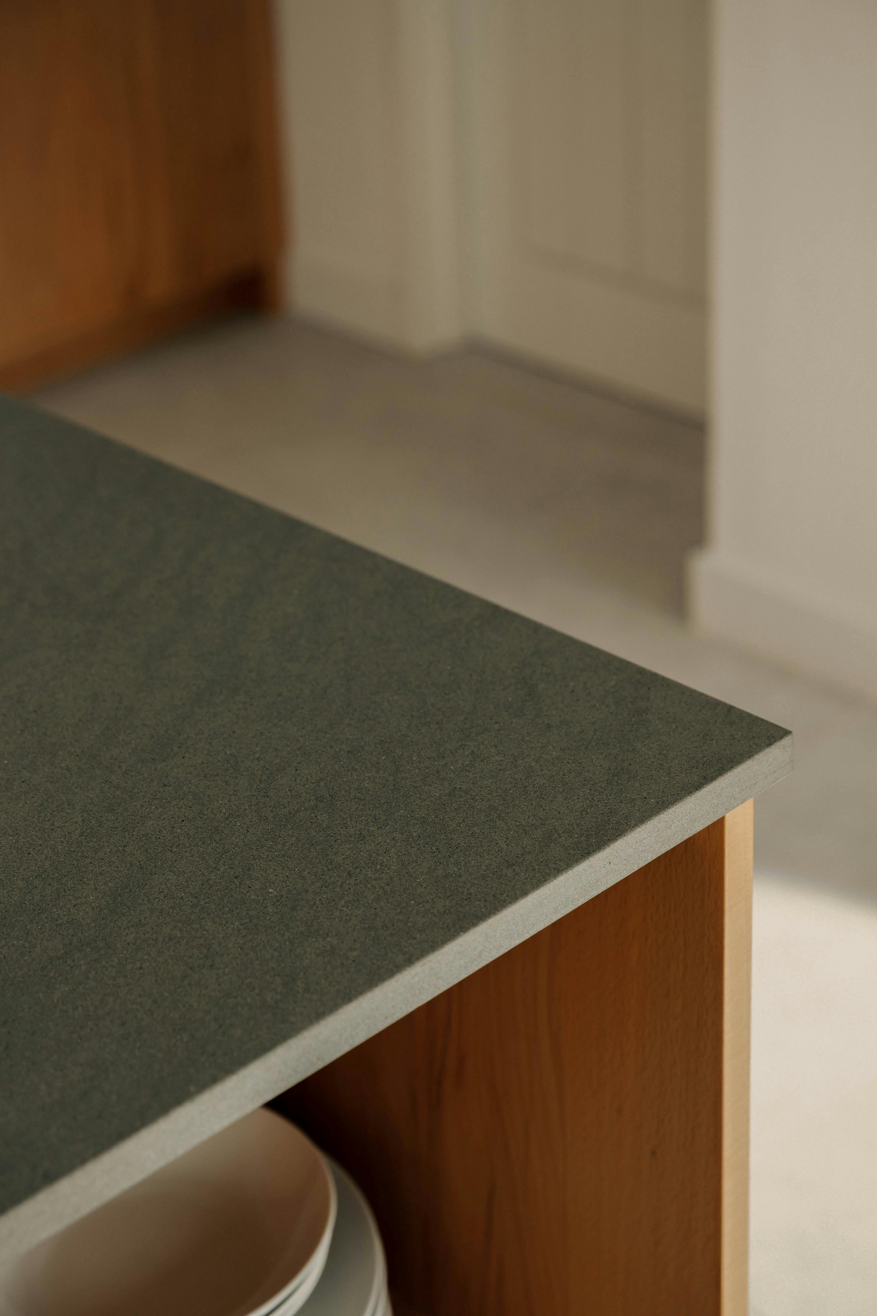 Contemporary wooden Ma-kon kitchen with limestone worktop in Northumberland.