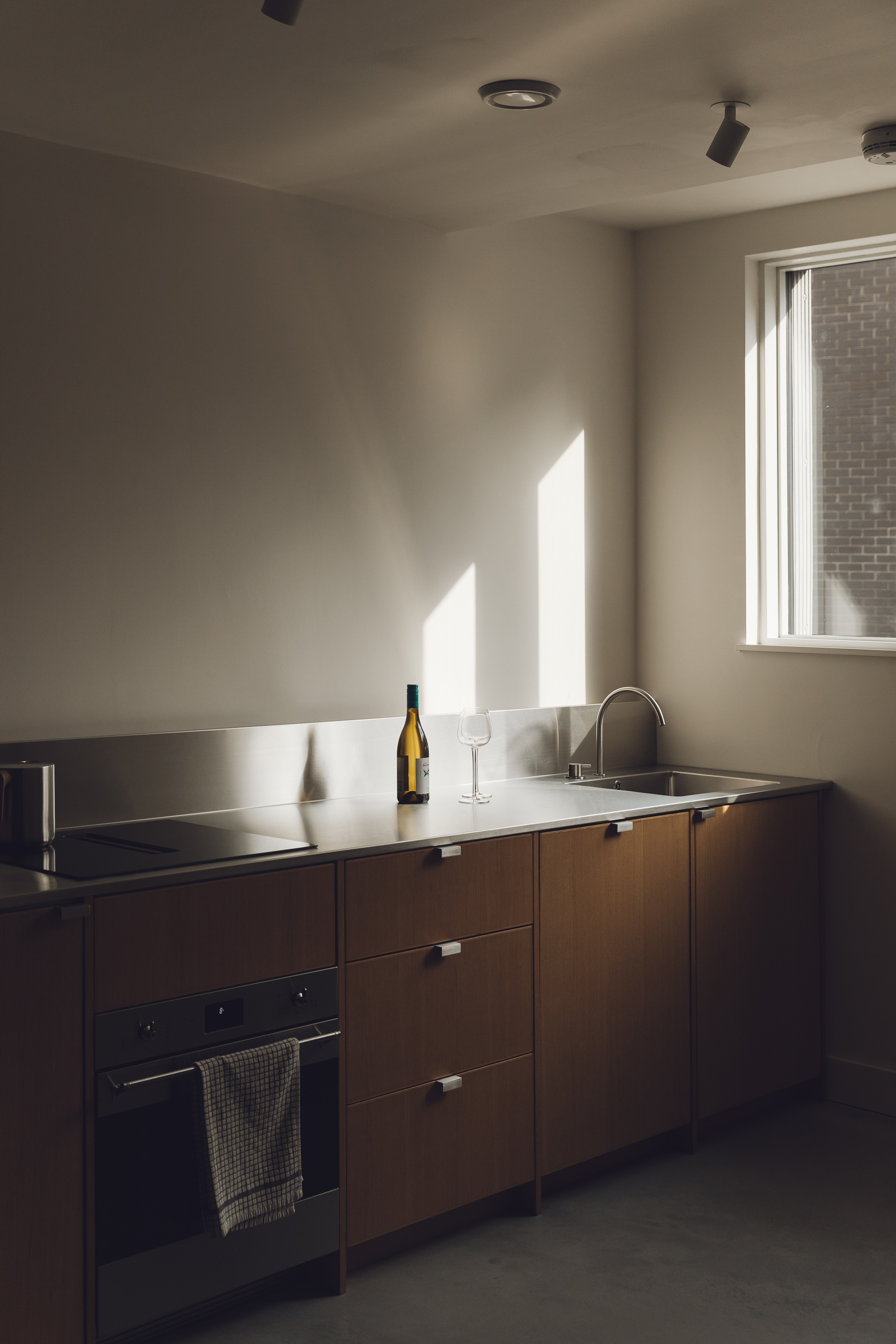 Contemporary wooden and stainless steel Ma-kon kitchen in Sheffield.
