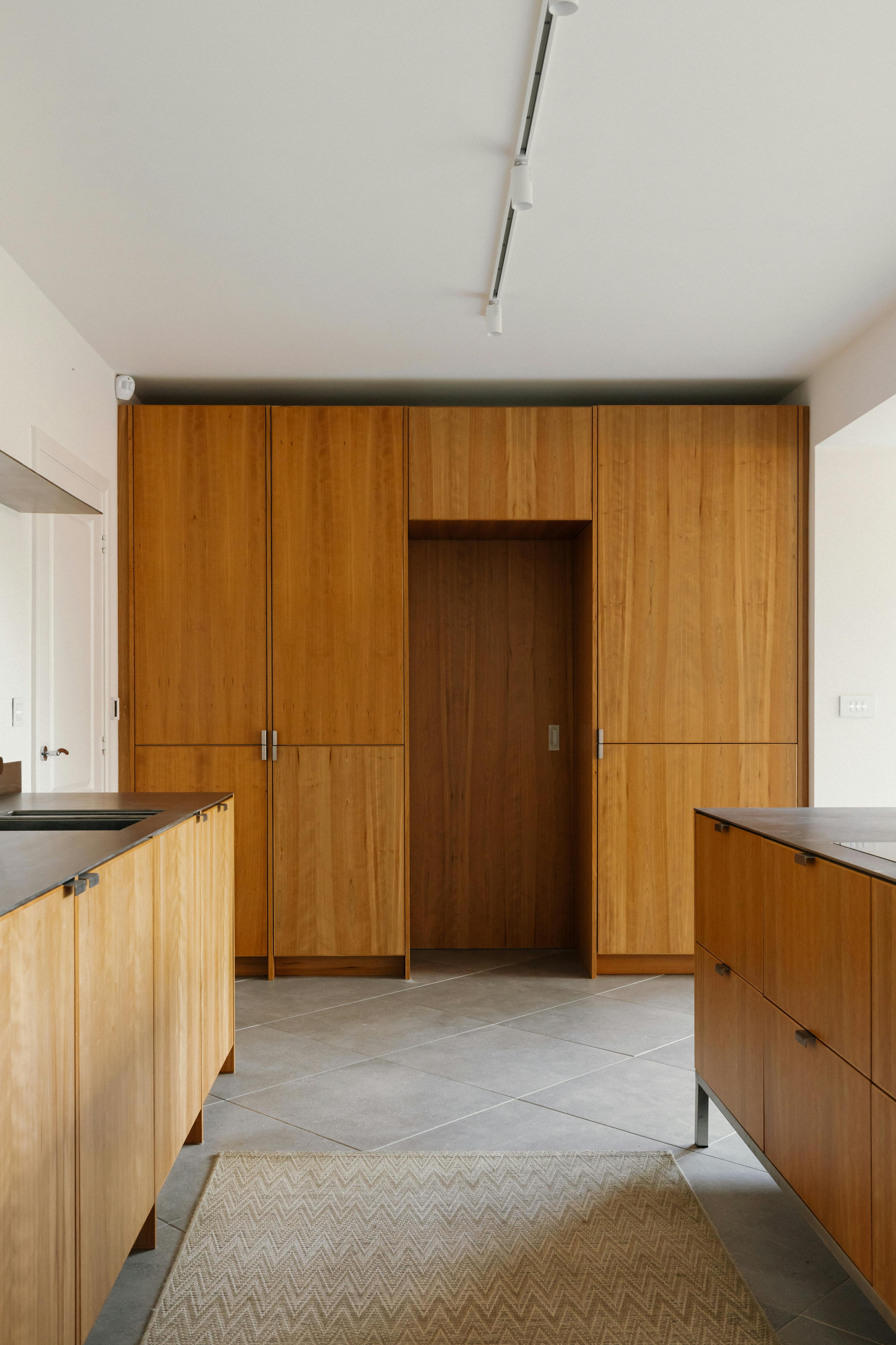 Contemporary cherry timber and stainless steel Ma-kon kitchen.