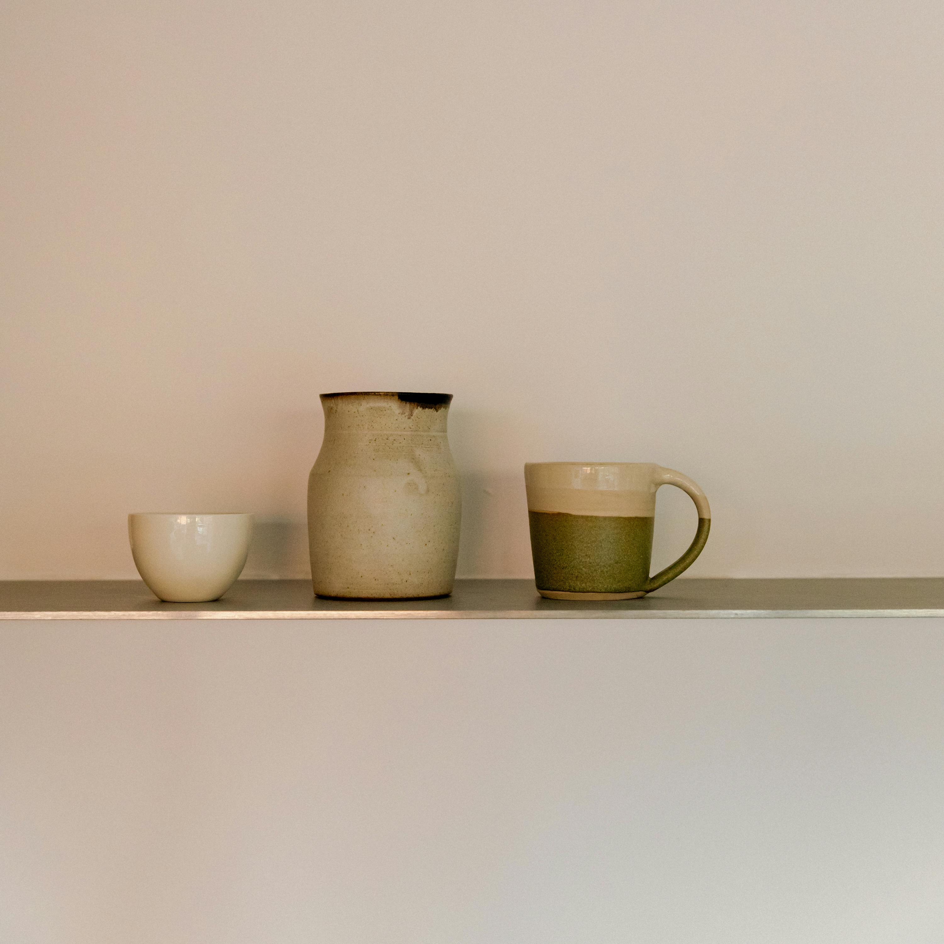 Contemporary cherry timber and stainless steel Ma-kon kitchen.