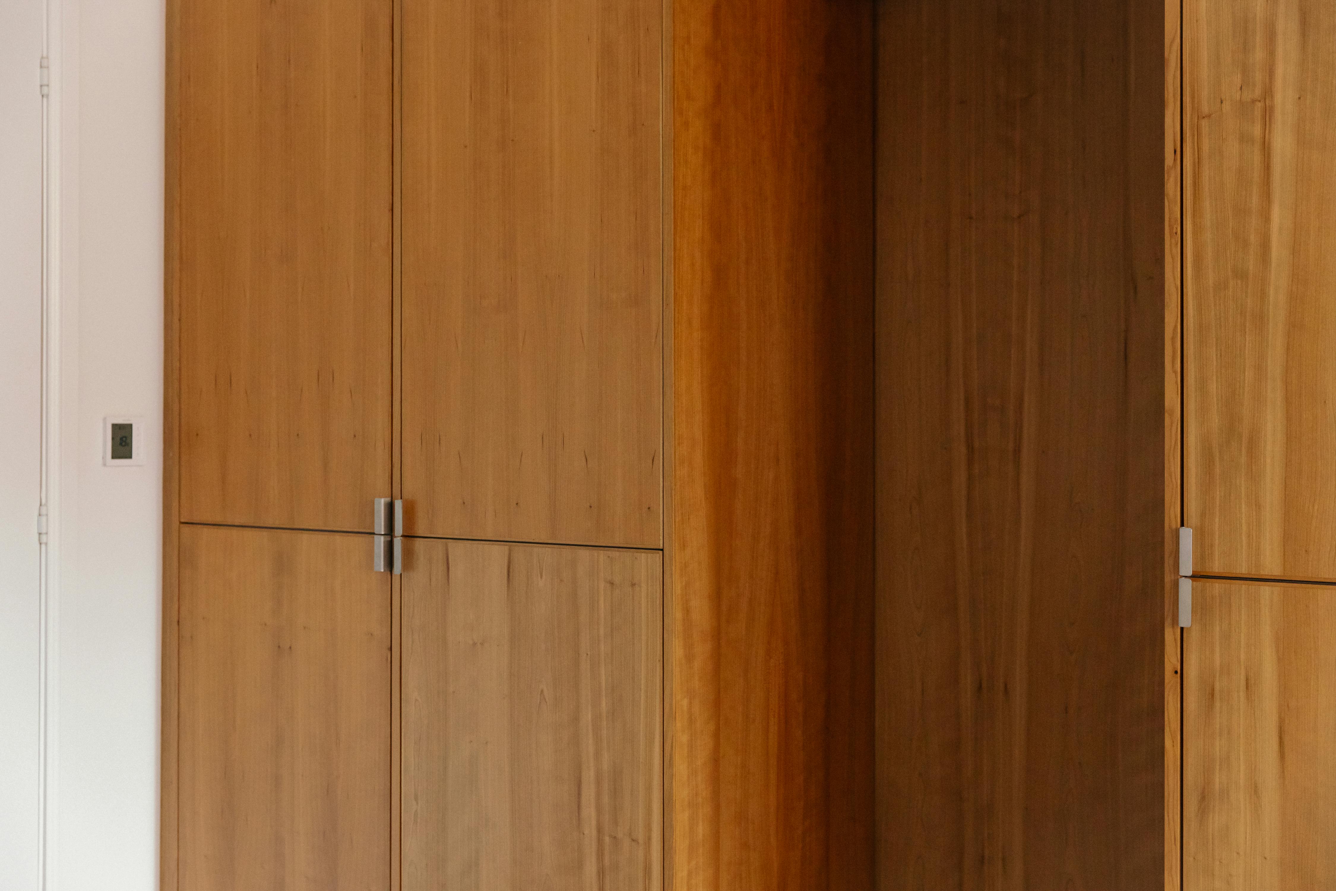 Contemporary cherry timber and stainless steel Ma-kon kitchen.