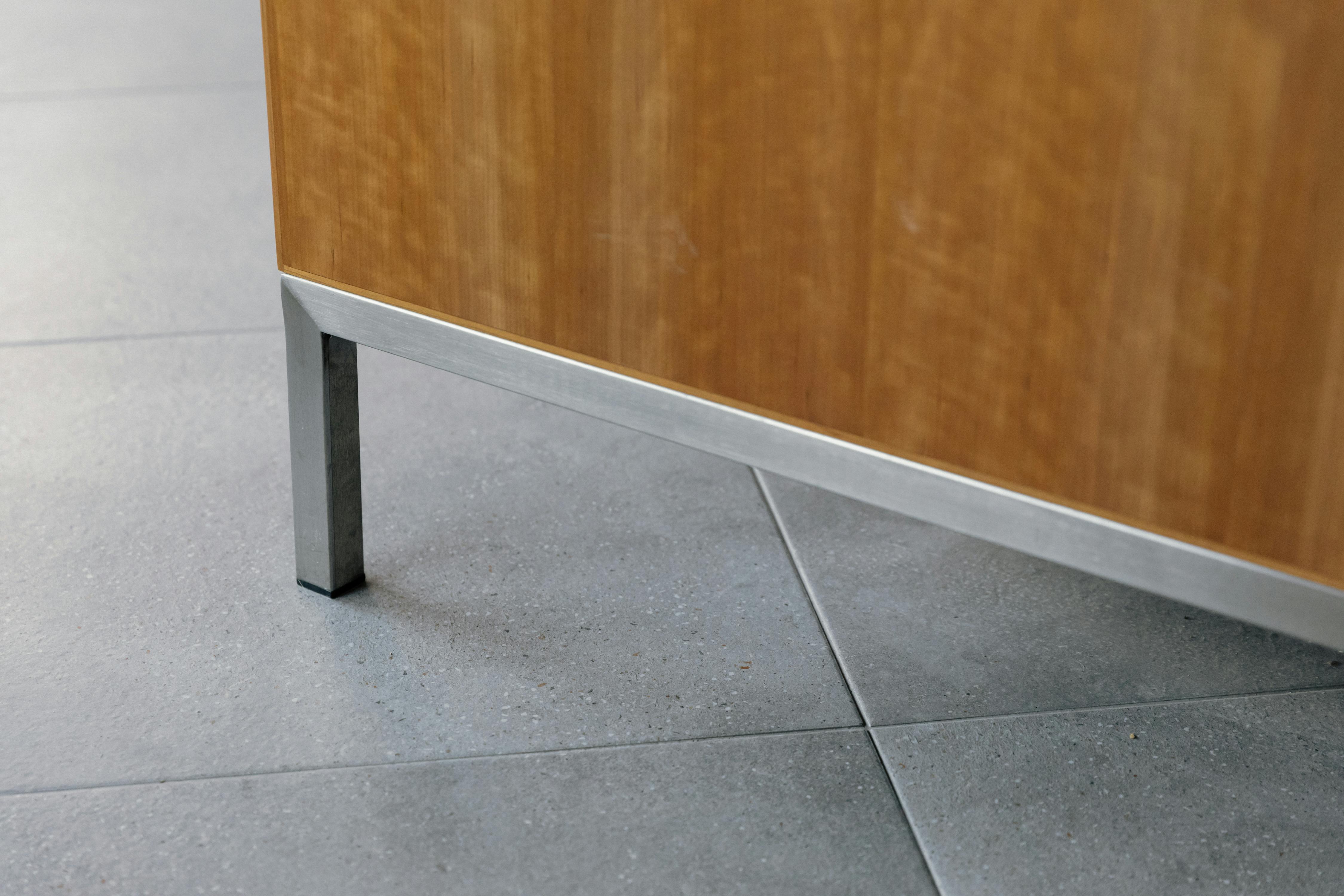 Contemporary cherry timber and stainless steel Ma-kon kitchen.