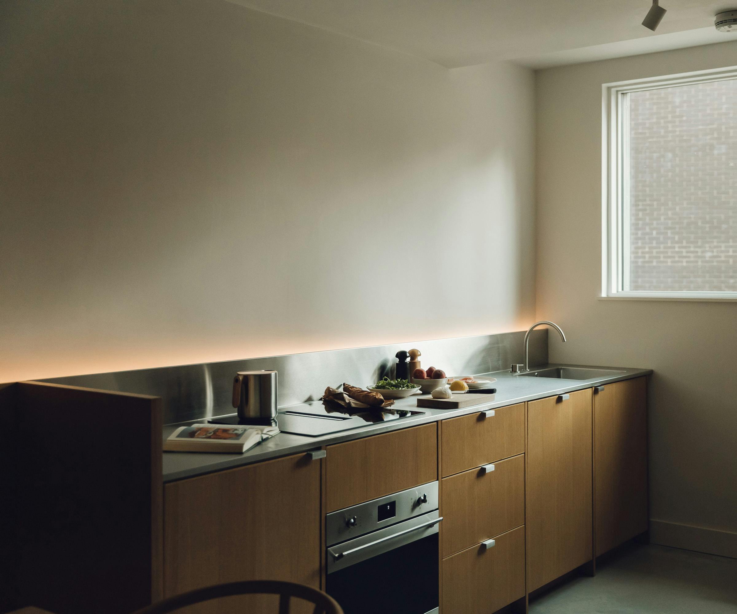 Contemporary wooden and stainless steel Ma-kon kitchen in Kelham Island, Sheffield.
