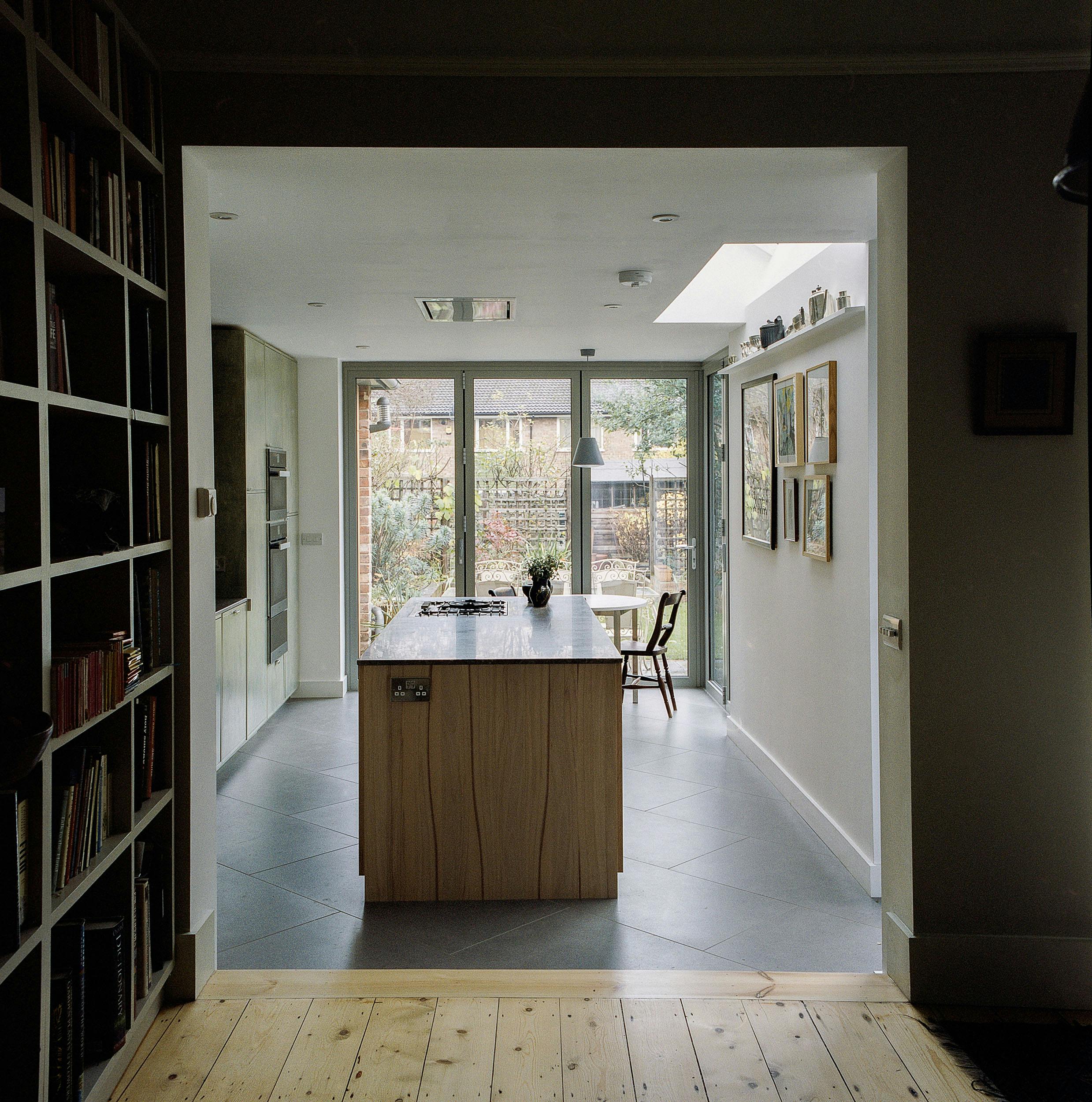 Contemporary wooden Ma-kon kitchen with limestone worktop in Sheffield.