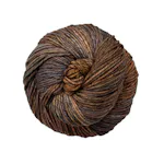 Picture of Malabrigo Rios Capricorn: A richly variegated earthy brown colorway featuring a deep blend of chestnut and cocoa tones, interwoven with dark charcoal shading and subtle hints of golden tan.