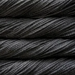 Picture of Malabrigo Vientos Black: A rich, classic solid black colorway featuring deep jet-black tones with subtle sheen and charcoal depth throughout.