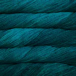 Picture of Malabrigo Arroyo Greenish Blue: A deep, rich teal and petrol blue yarn with subtle tonal variations.