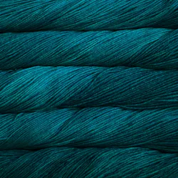 Picture of Malabrigo Arroyo Greenish Blue: A deep, rich teal and petrol blue yarn with subtle tonal variations.