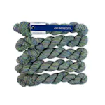 Picture of Malabrigo Ultimate Sock Minis Indiecita: Ultimate Sock Minis skein in a variegated colorway with teal, blue-green, and turquoise tones.
