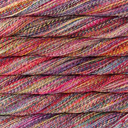 Picture of Malabrigo Torzal Aniversario: Torzal skein in a variegated colorway with warm coral, pink, and orange tones