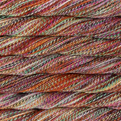 Picture of Malabrigo Torzal Euforia: Torzal skein in a variegated colorway with warm terracotta, rust, and muted pink tones