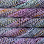 Picture of Brisa Pisces: Soft lavender and slate blue yarn with subtle gold and teal speckles.