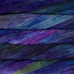Picture of Malabrigo Arroyo Indonesia: A deeply complex, richly variegated blend of deep sapphire blue, saturated magenta-purple, and rich emerald green tones.