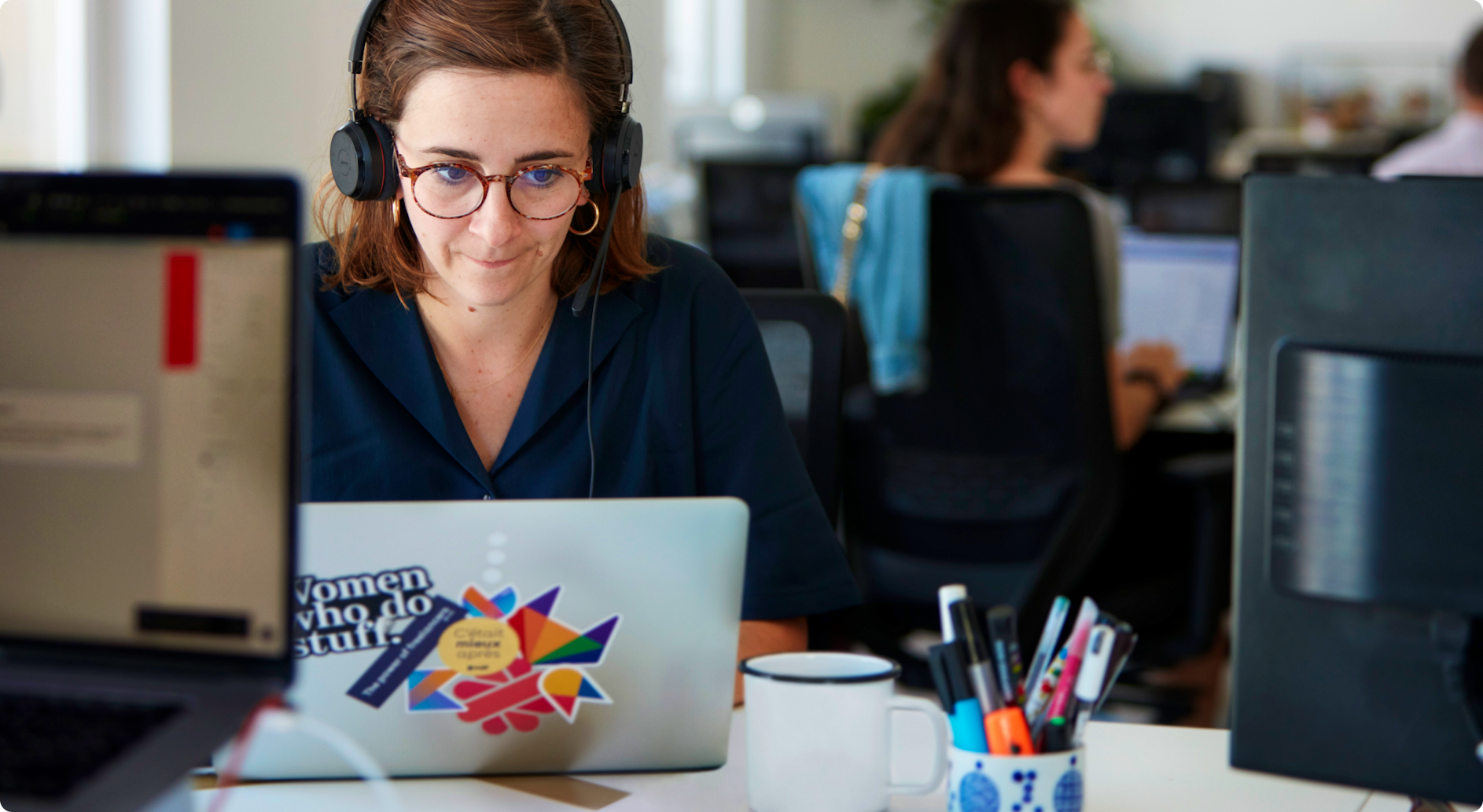 picture of a woman working on a laptop