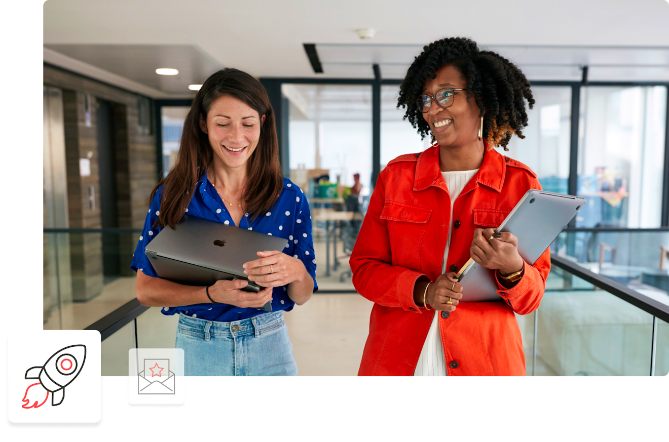 two women talking and smiling with a rocketship icon