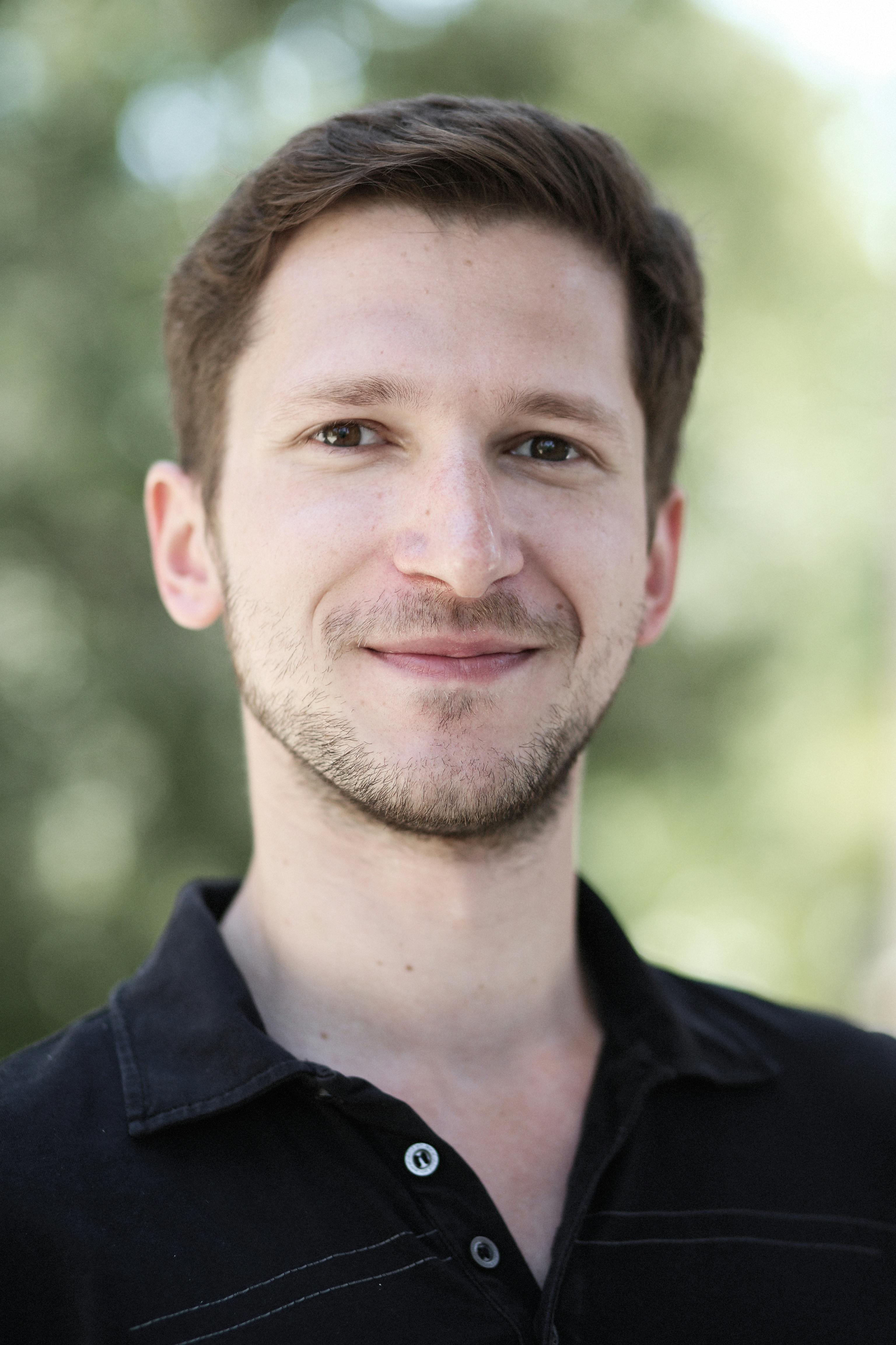 portrait of Jakub Full-stack + Ops Developer