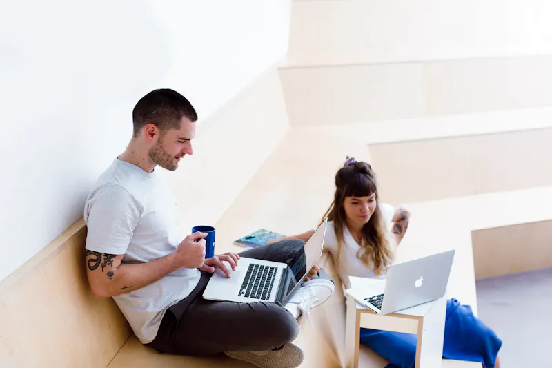 Two people working together