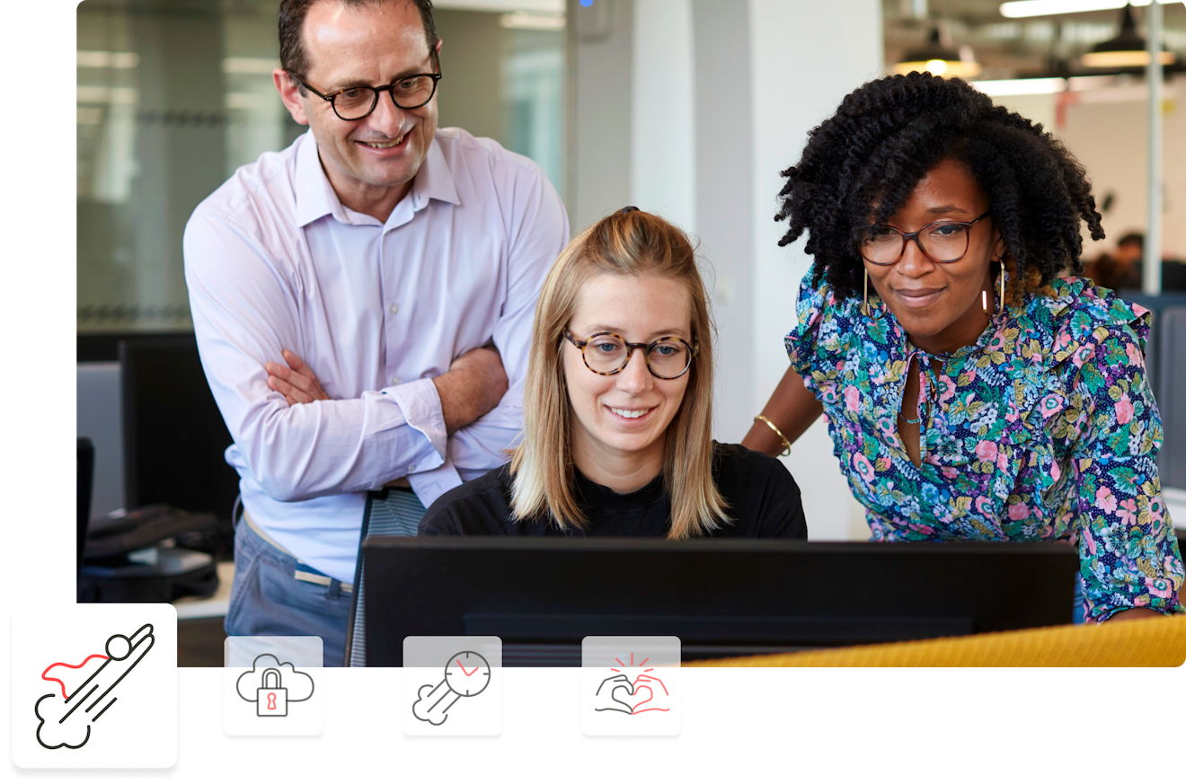 three people looking at a laptop