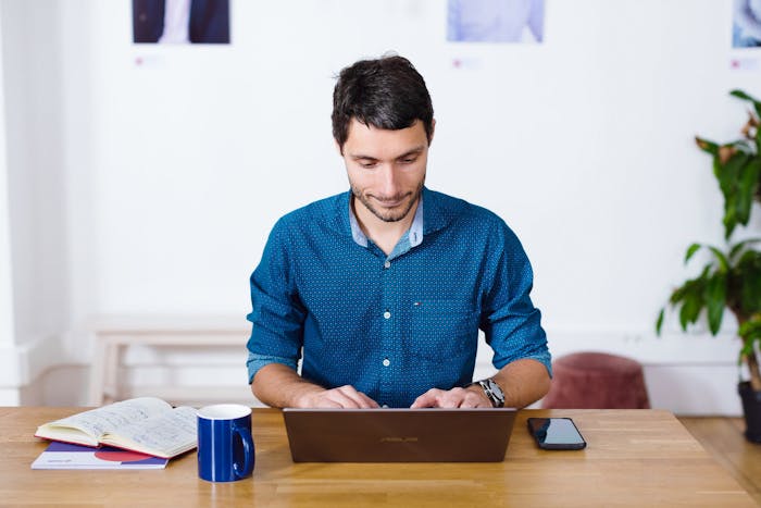 person working on their laptop