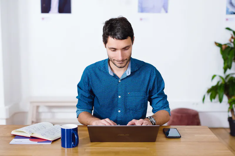 person working on their laptop