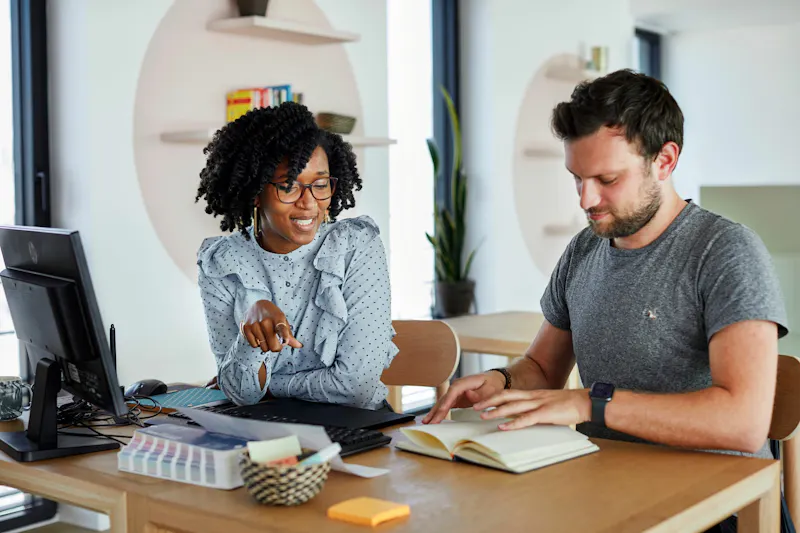 two person working together