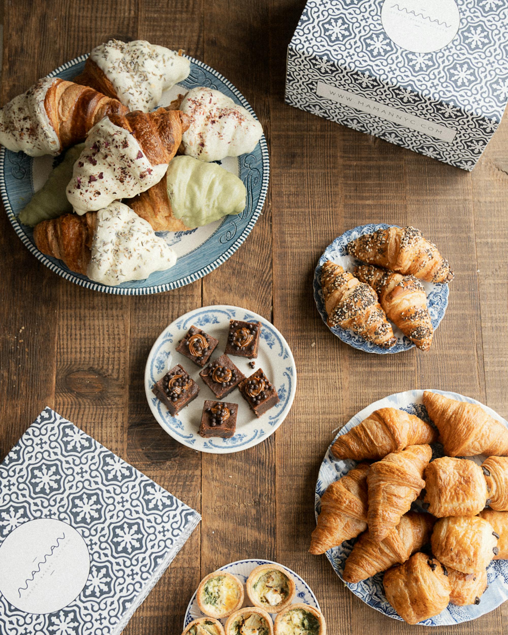 pastries and blue maman boxes on table