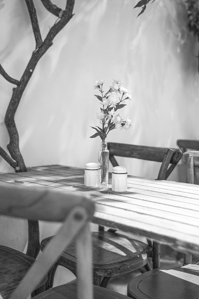 rockefeller table with floral vase