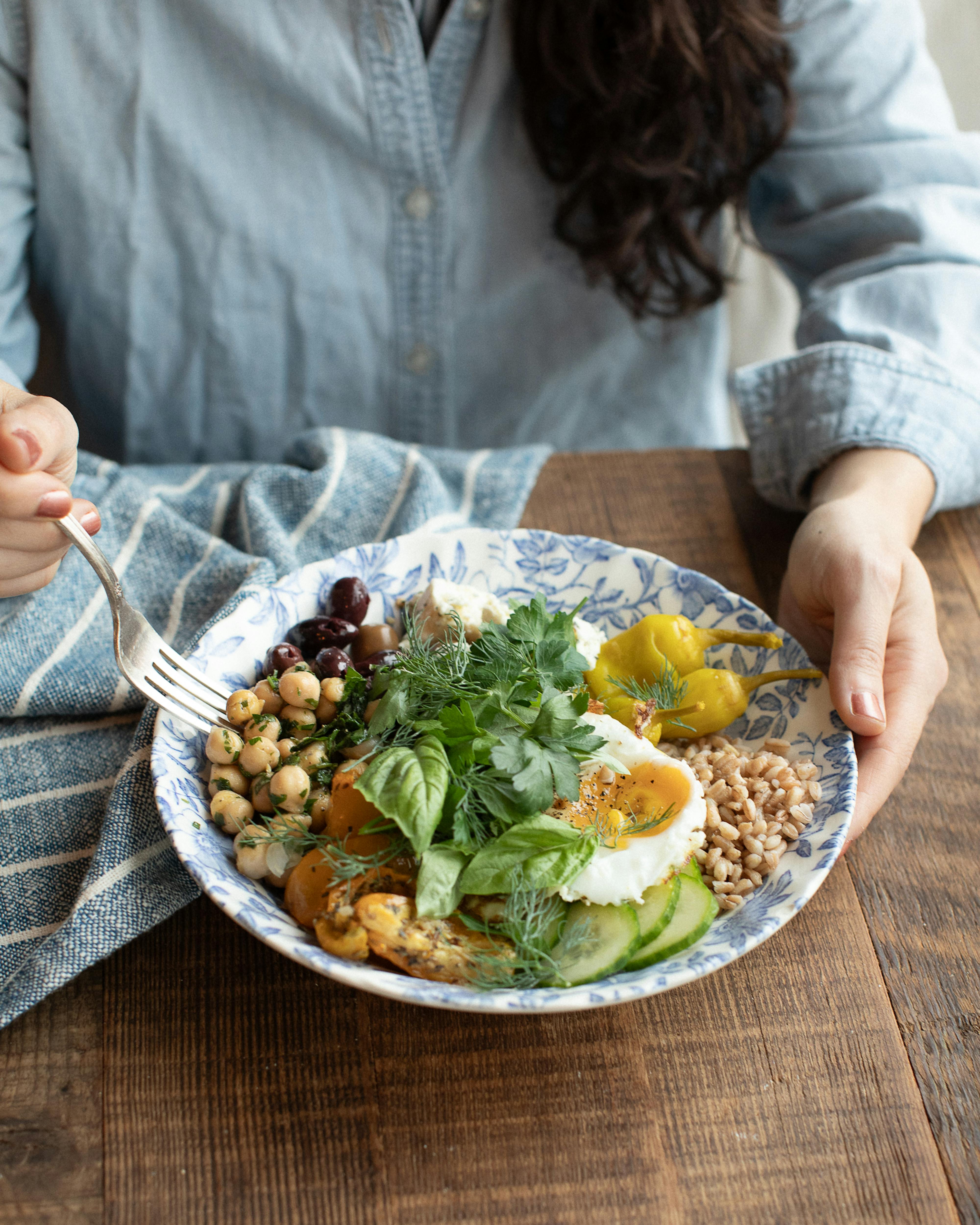 woman eating salad